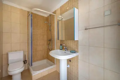 a bathroom with a toilet and a sink and a shower at Villa Ancora - Nex to the Beach - Parking - Swimming Pool - BY BEDZY in Albufeira
