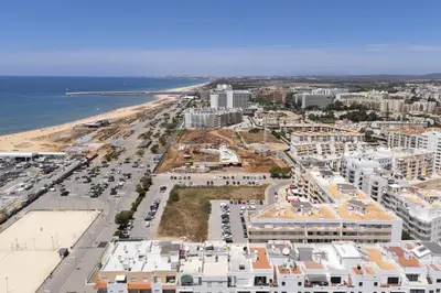 an aerial view of a city and the beach at Espadarte - Sea view by HD in Quarteira