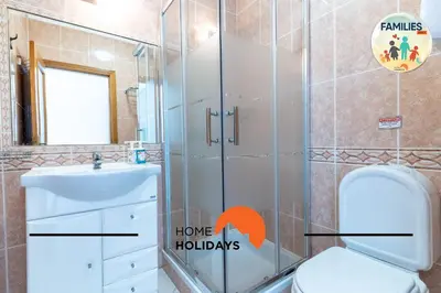 a bathroom with a shower and a toilet and a sink at #275 Only Families - A Flor by Home Holidays in Albufeira