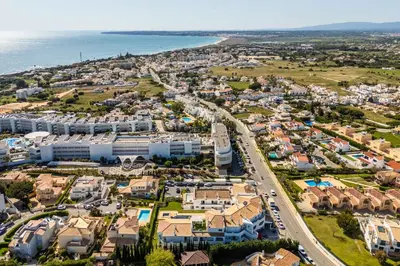 an aerial view of a city with the ocean at São Rafael 1 Bedroom with Pool in Albufeira