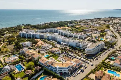 an aerial view of a resort near the ocean at São Rafael 1 Bedroom with Pool in Albufeira