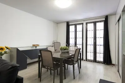 a dining room with a table and chairs at Fonte Moura - With pool by HD in Vilamoura