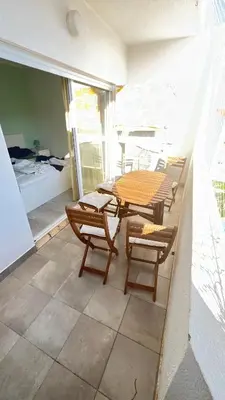 a table and chairs on a balcony with a table at Panoramic View in Albufeira
