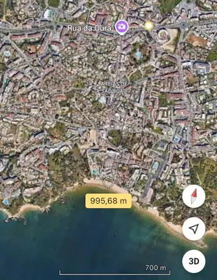a white building with a tunnel in front of it at Central View 990 meters from beach on foot in Albufeira