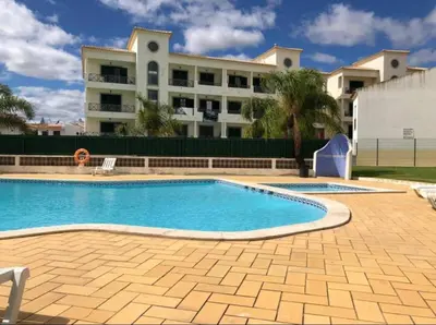 a room with a fire extinguisher on a wall at Central View 990 meters from beach on foot in Albufeira