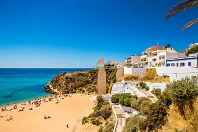 a group of people on a beach near the ocean at Spacious Villa by Algarve Dream Holidays in Albufeira