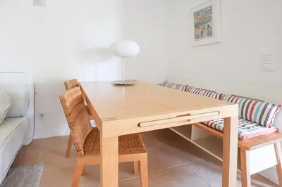 a living room with a couch and two tables at Apart Salgados Village - Near to the Beach - BY BEDZY in Guia