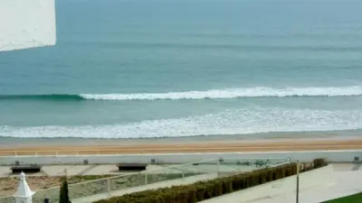 a view of the beach and the ocean from a building at T0 close to the beach and the city center in Albufeira