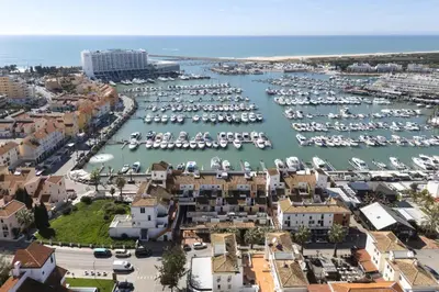 an aerial view of a harbor with boats at Marina Club II - Marina view by HD in Vilamoura