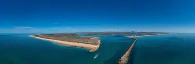 an aerial view of an island in the ocean at Algarve Apartment, Faro - Excellent Location in Faro