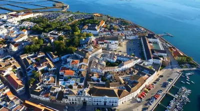 an aerial view of a small island in the water at Algarve Apartment, Faro - Excellent Location in Faro