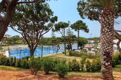 an aerial view of a resort with a swimming pool at Apartamento Tennis View in Almancil