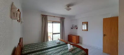 a bedroom with a bed and a window at Caranguejo Apartment in Albufeira