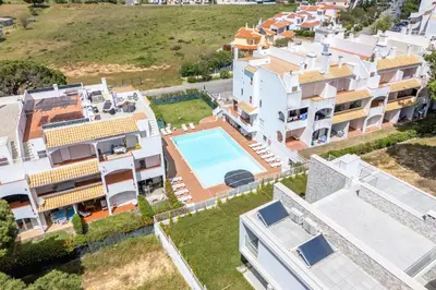 an aerial view of a villa with a swimming pool at Apartamento Pine by Algarve Holidays in Roja- Pé