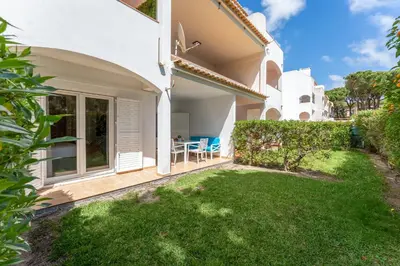 a view of a house with a yard at Apartamento Pine by Algarve Holidays in Roja- Pé