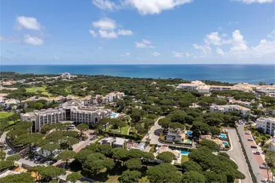 an aerial view of a city with the ocean at Apartamento Pine by Algarve Holidays in Roja- Pé