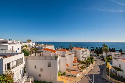 an aerial view of a city with the ocean at Apartment Atlas in Albufeira