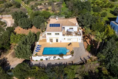 an aerial view of a house with a swimming pool at Casa Federica by Algarve Holidays in Santa Bárbara de Nexe