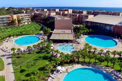 an aerial view of a resort with two pools at Herdade dos Salgados in Guia