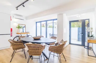 a pair of chairs sitting on top of a balcony at Casa Milea - Vilamoura Marina in Vilamoura