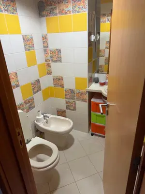 a bathroom with a toilet and a sink at Marina Albufeira Best Apartment in Albufeira