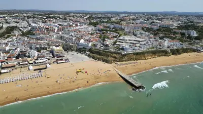 an aerial view of a beach with a pier at #326 Vista Mar by Home Holidays in Albufeira