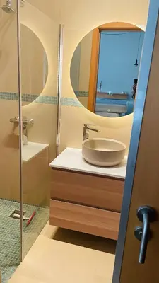a bathroom with a sink and a mirror at B&B Casa Encantada in Boliqueime