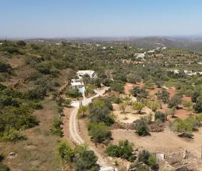 an aerial view of a road leading to a house at B&B Casa Encantada in Boliqueime