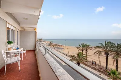 a balcony with a view of the beach at Apartamento Mar Azul - Quarteira in Quarteira