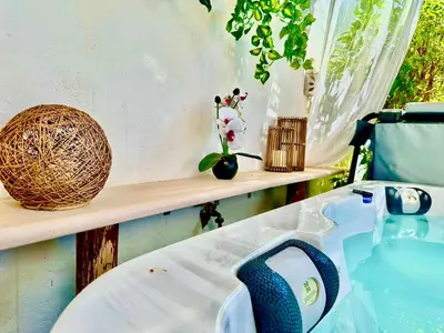 a bathroom with a bath tub and a sink at Villa SOLAR DO MONTE 5 in Albufeira