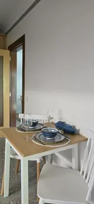 a dining room table with plates and glasses on it at Quinta Do Vale 32 by AL in Guia