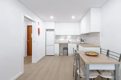 a living room with a table with a bowl on it at Albufeira Old Town Apartment in Albufeira