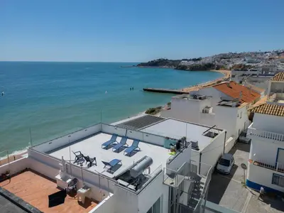 a view of the ocean from the roof of a building at Holiday Home Nannoush - Vip Properties by Interhome in Albufeira