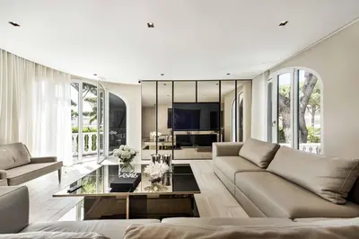 a living room with a couch and a table at Villa Melvin in Quarteira