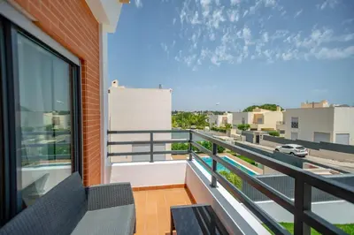 a balcony with a view of a street at Villa Velluto in Albufeira