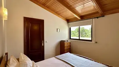 a bedroom with a bed and a window at Sun by Check-in Portugal in Albufeira