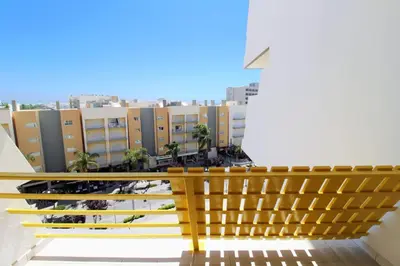 a view from the balcony of a building at Al-Charb Retreat by SAPvillas in Quarteira