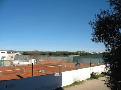 a tennis court with a bunch of tennis courts at T1 in Albufeira near Alfamar Hotel in Albufeira