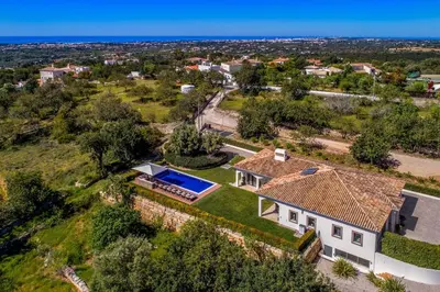 an aerial view of a house with a yard at Villa Zambujal in Boliqueime