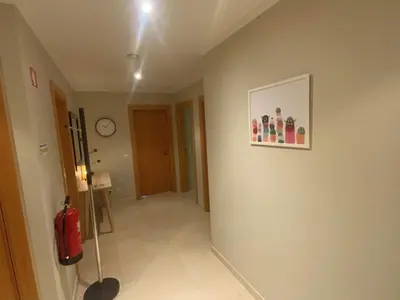 a hallway with a fire hydrant in a room at Luxury ground-floor appartment 5 stars, 2 bedrooms, 2 bathrooms, Free Wifi in Albufeira