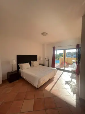 a hammock on the balcony of a condo at Vilamoura townhouse in private gated condominium in Quarteira