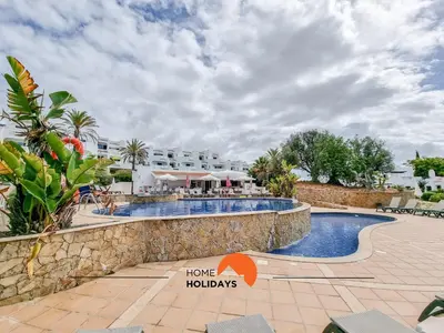 a resort with a swimming pool and a hotel at #322 Albufeira Family Stay by Home Holidays in Albufeira