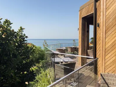 a view of the ocean from the balcony of a house at 3HB Falesia Beach in Albufeira