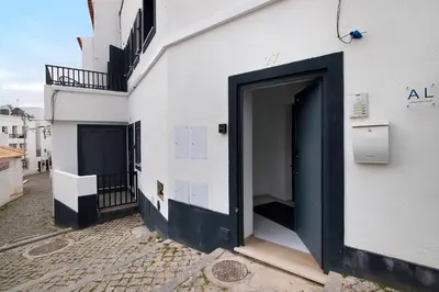 a building with a door on the side of it at Mi Casa Es Su Casa Nº3 in Albufeira