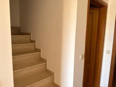 a stairway in a house with a stair case at Townhouse Sol&Mar Vilamoura in Vilamoura