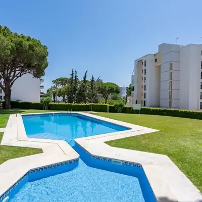 HostWise - Sunny Escape with a Pool & Balcony