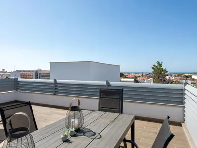 a white room with a bed and a tv at Villa Linda V3 Lote 67 - VIP Properties by Interhome in Albufeira