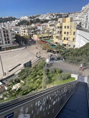 a view of a city from the balcony of a building at Casa Tapada do Bento III- Albufeira in Albufeira