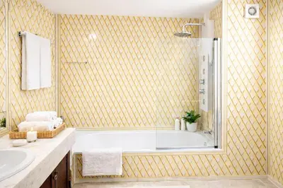 a bathroom with a tub and a sink at Ocean Bliss II- Panoramic Sea View - 20m to Beach - 2 Swimming Pools - Private Parking in Albufeira