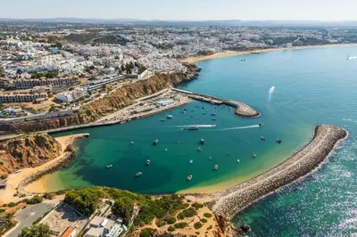 an aerial view of a harbor with boats in the water at Baleeira Sea View Studio in Albufeira